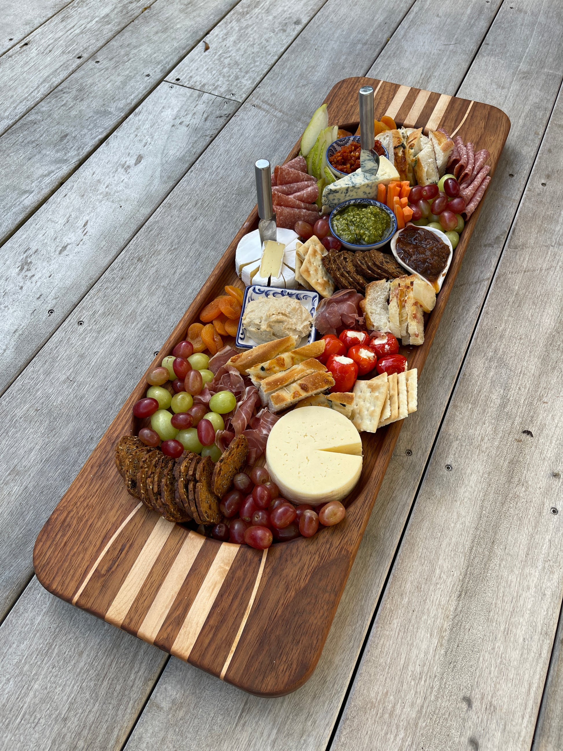 Premium Walnut and Maple serving board, handcrafted in Auckland with artisan precision.