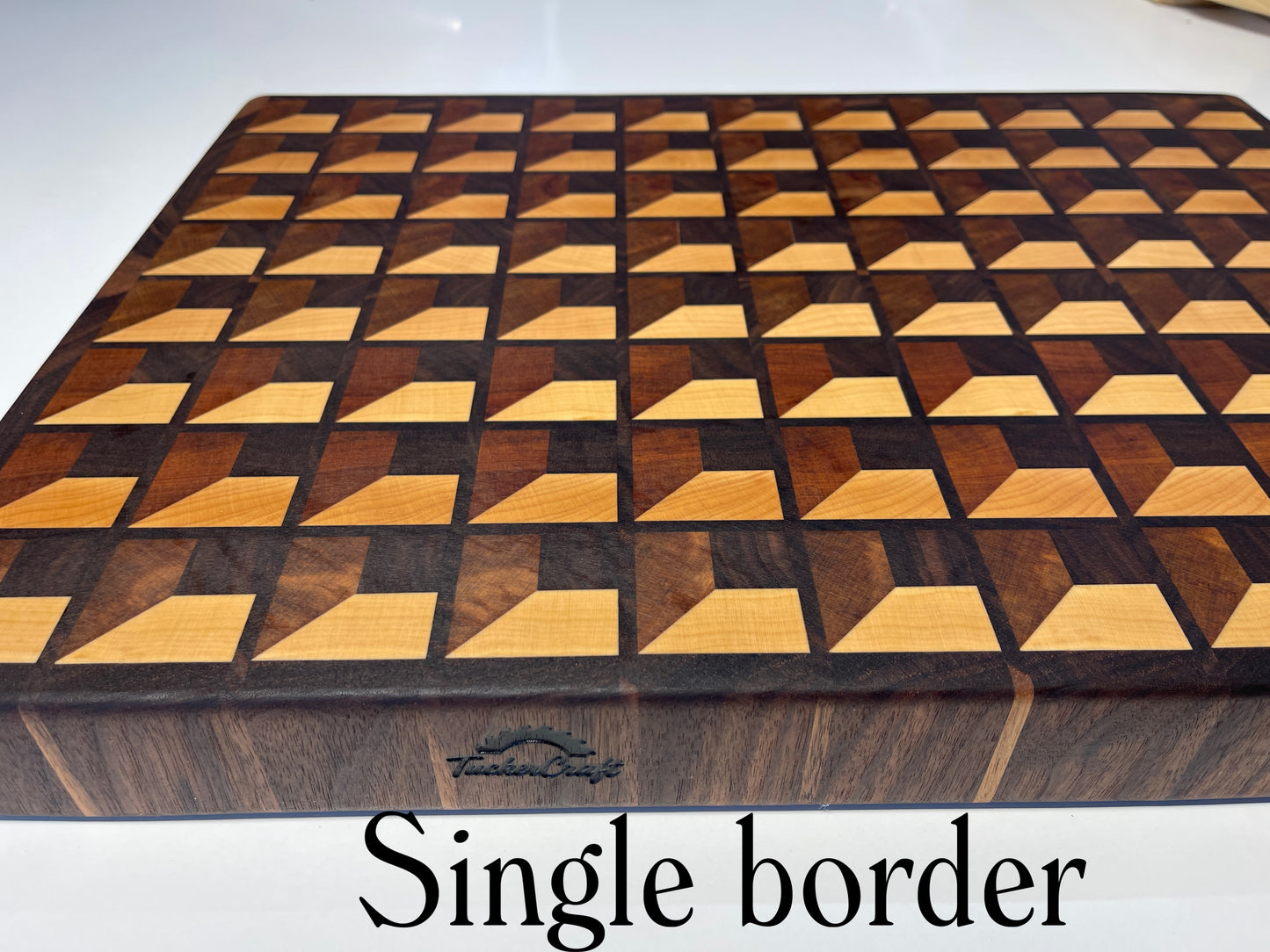 Luxury Walnut, Maple & Rimu End grain chopping board with geometric waffle pattern. Handcrafted by Tuckercraft NZ