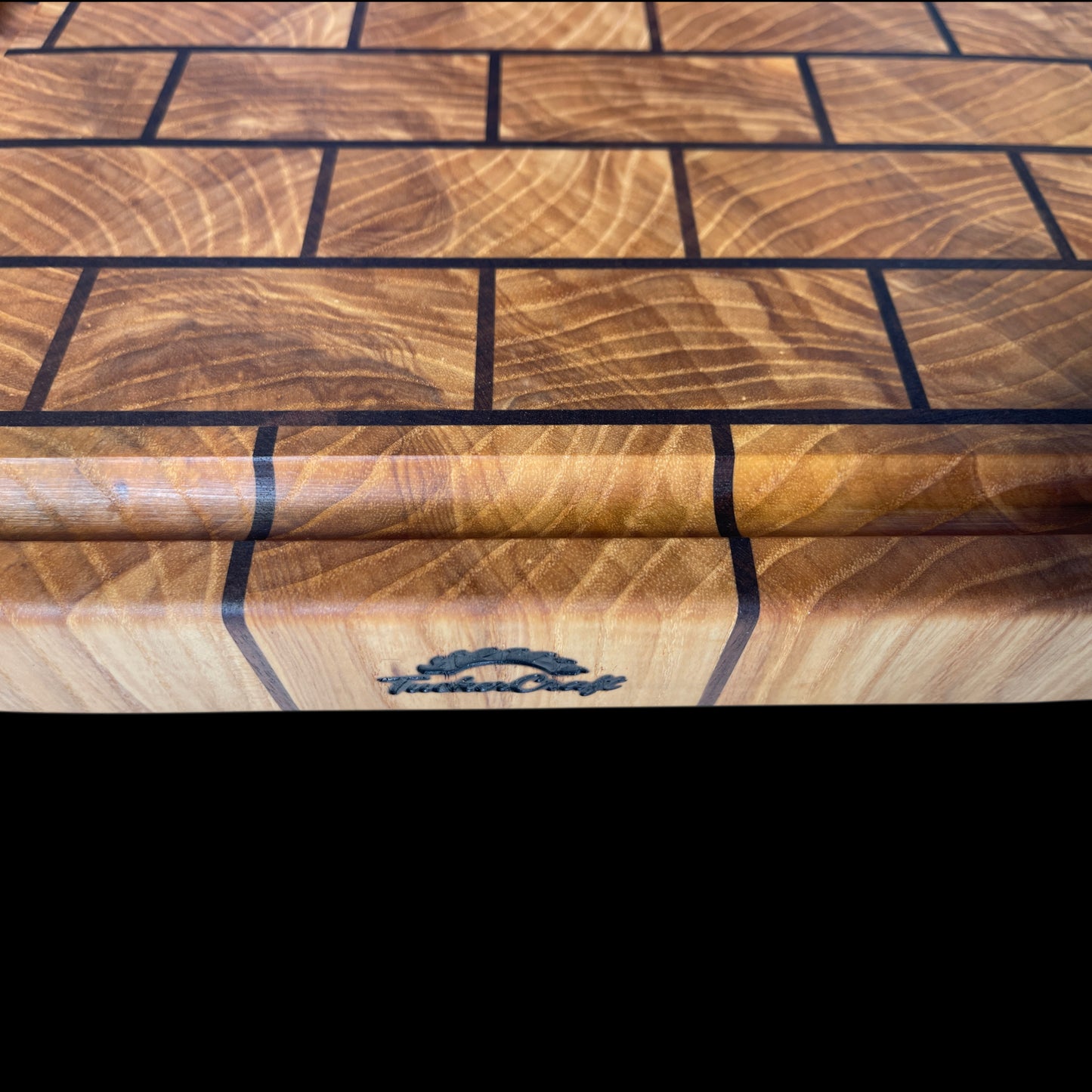 Handcrafted Ash and Walnut end-grain brick pattern chopping board with juice groove - luxury wooden butcher block made in New Zealand.
