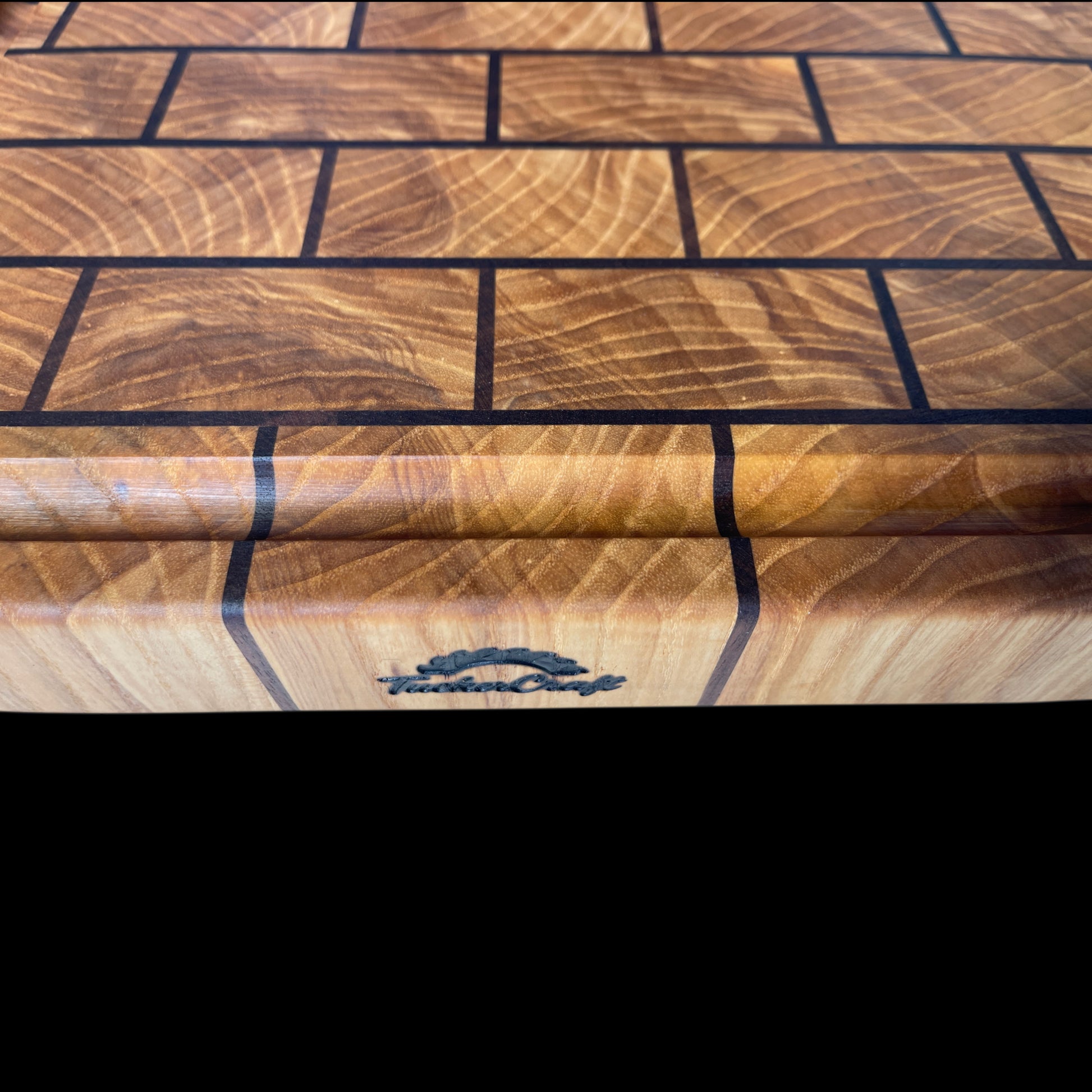 Handcrafted Ash and Walnut end-grain brick pattern chopping board with juice groove - luxury wooden butcher block made in New Zealand.