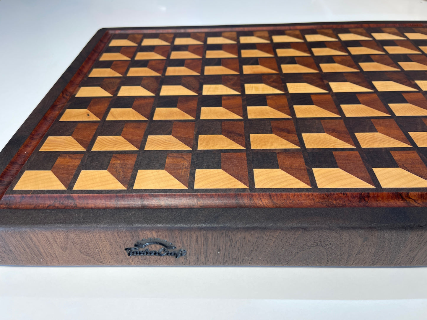 Luxury Walnut, Maple & Rimu End grain chopping board with geometric waffle pattern. Handcrafted by Tuckercraft NZ