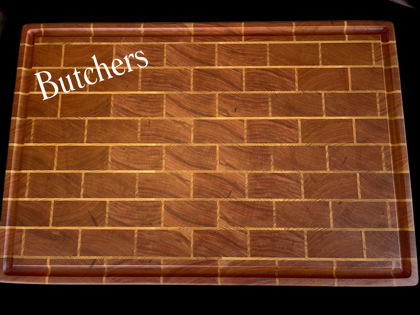 Handcrafted butcher block chopping boards by Tuckercraft,  in premium hardwoods Cherry & Maple. Luxury New Zealand cutting boards ideal for entertaining, gourmet kitchens, wedding gifts and heirloom gifting