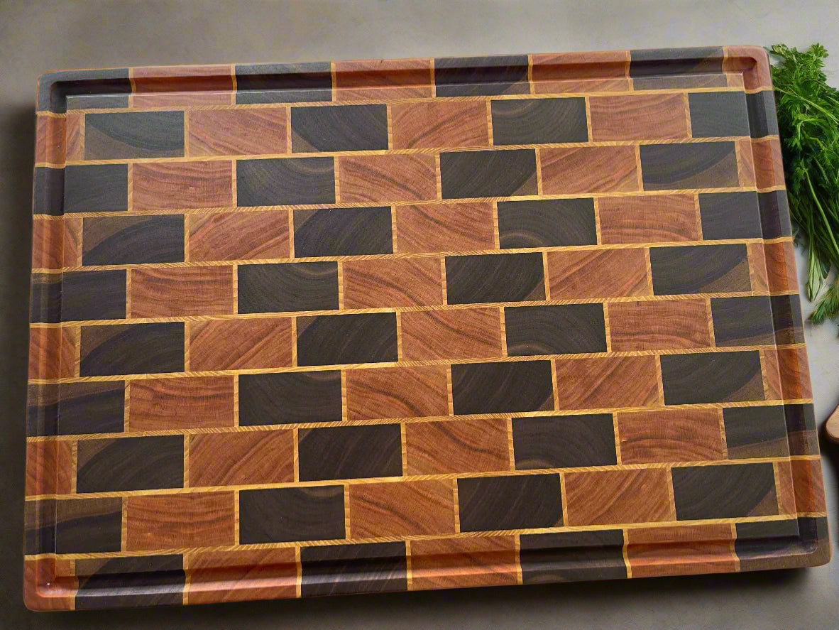 Handcrafted butcher block chopping boards by Tuckercraft,  in premium hardwoods Walnut, Cherry & Maple. Luxury New Zealand cutting boards ideal for entertaining, gourmet kitchens, wedding gifts and heirloom gifting