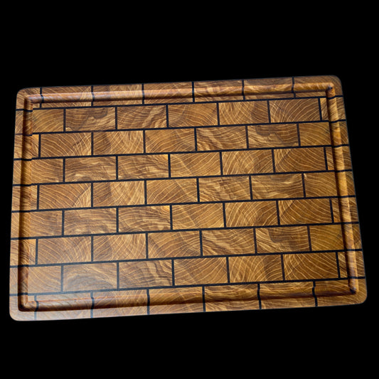 Handcrafted Ash and Walnut end-grain brick pattern chopping board with juice groove - luxury wooden butcher block made in New Zealand.