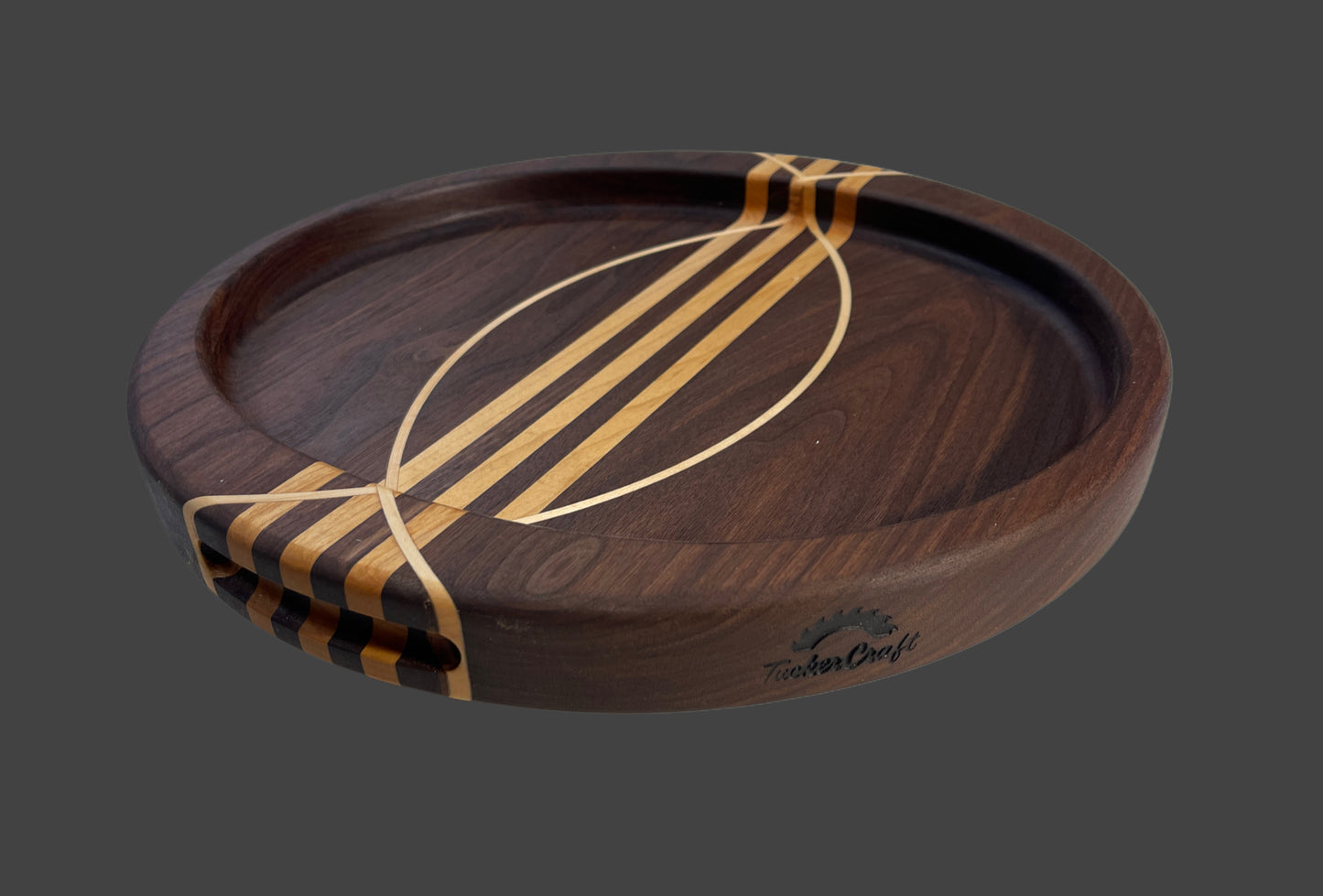 Large round designer charcuterie board, Featuring finger holds and hollowed basin for holding snacks. designed for home entertaining and ideal for Wedding, housewarming and special gifting
