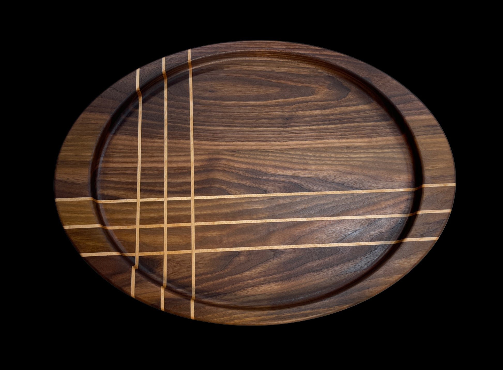 Handmade oval pattern charcuterie / cheese board. Made from premium hardwoods Walnut & Maple . Ideal for home entertaining and gifting, including weddings, housewarming, corporate and special gifts for him & he