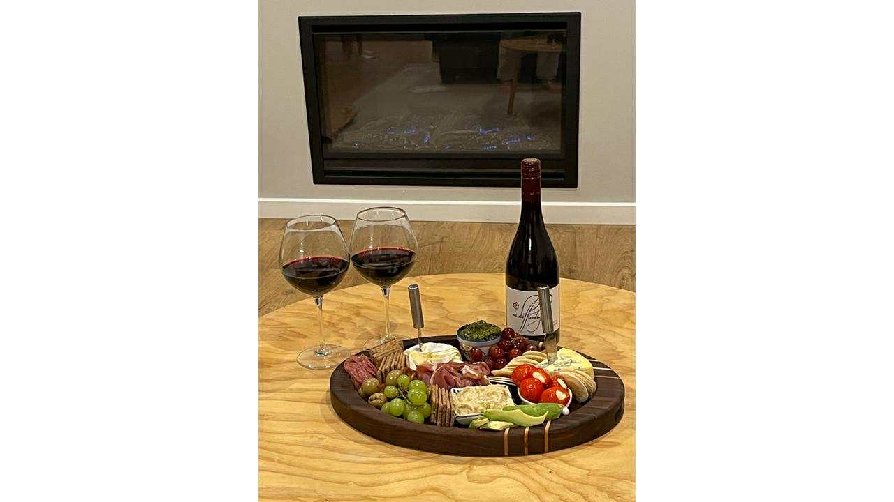 Handmade oval pattern charcuterie / cheese boards. Made from premium hardwoods Walnut & Maple . Ideal for home entertaining and gifting, including weddings, housewarming, corporate and special gifts for him & her