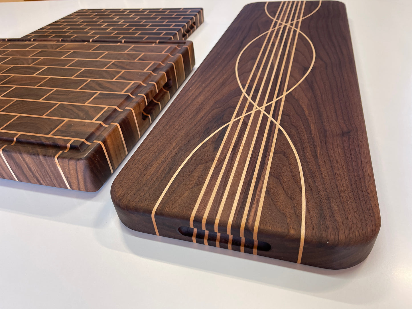 The Ultimate Luxury Kitchen collection for preparation and presentation . handmade from premium timbers walnut and maple. Designed to uplift culinary experience and kitchen 