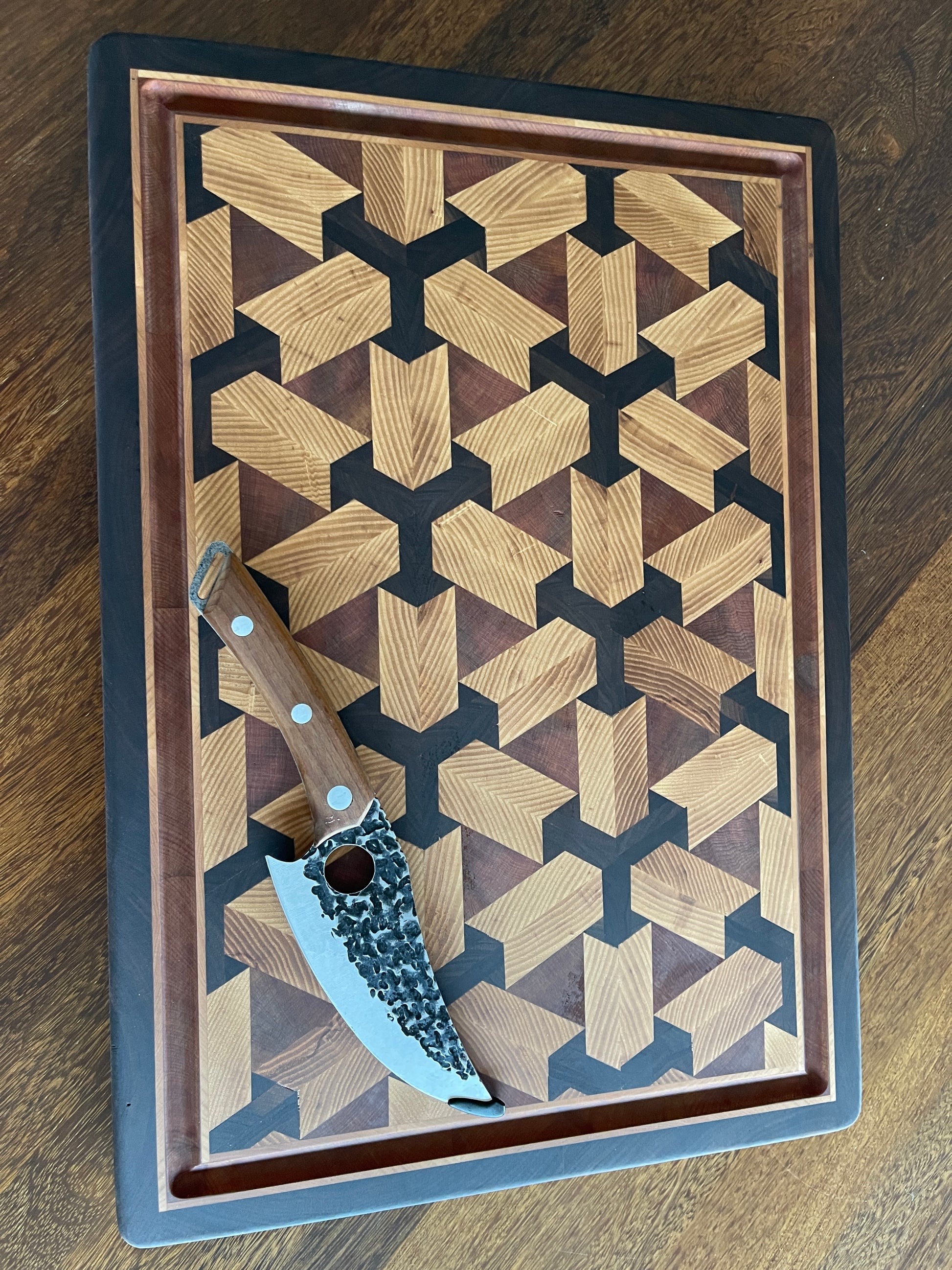 Premium handcrafted end grain chopping board featuring 3D Scaffold design in Walnut Ash & Rimu hardwood